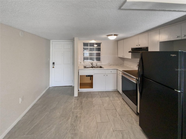 kitchen with light tile floors, black fridge, a textured ceiling, stainless steel electric range, and sink