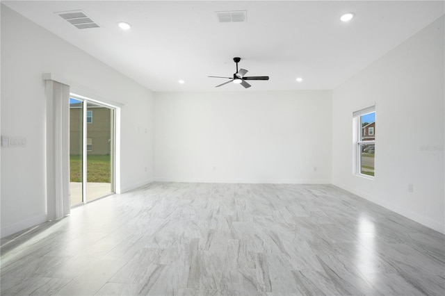 empty room featuring ceiling fan