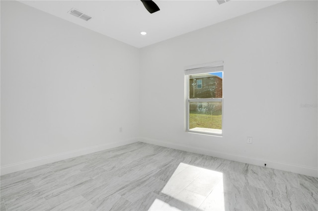 spare room featuring ceiling fan