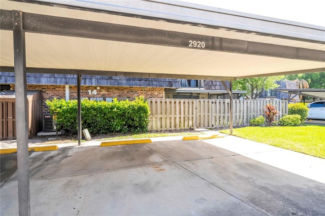 exterior space with a carport