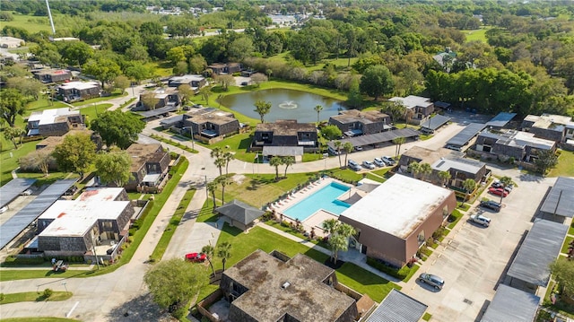 bird's eye view with a water view