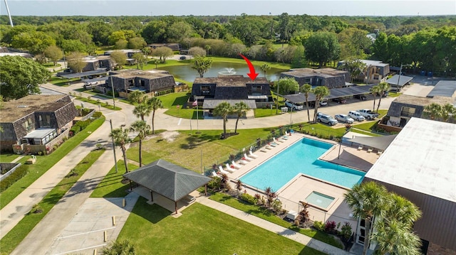 birds eye view of property featuring a water view