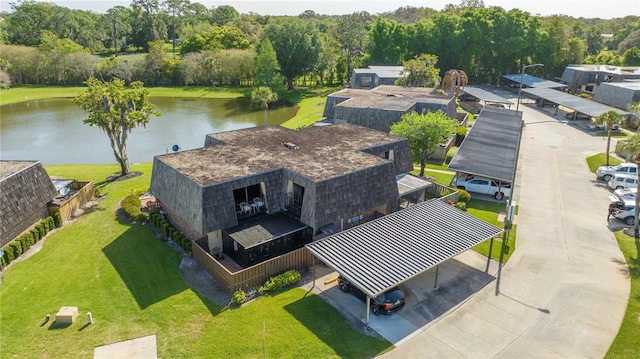 birds eye view of property featuring a water view