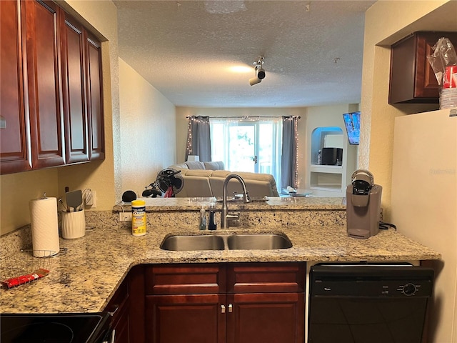 kitchen featuring a textured ceiling, kitchen peninsula, dishwasher, and sink