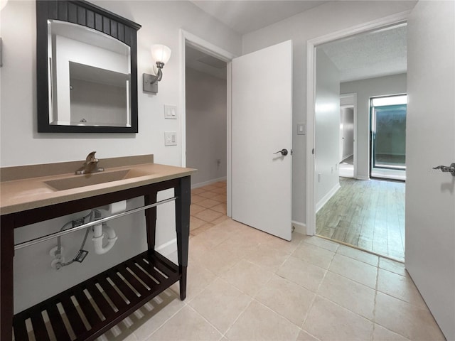 bathroom featuring vanity and hardwood / wood-style flooring