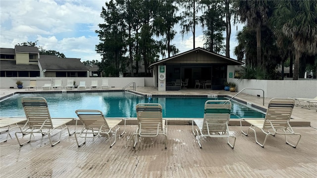 view of pool featuring a patio