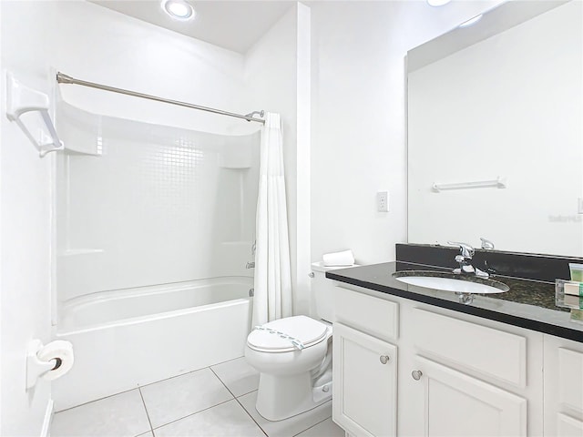 full bathroom featuring toilet, shower / bath combo with shower curtain, large vanity, and tile flooring