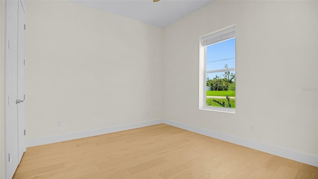 empty room with light wood-type flooring