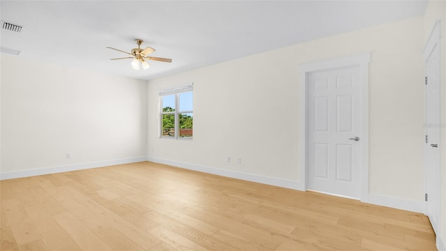 unfurnished room with light hardwood / wood-style flooring and ceiling fan