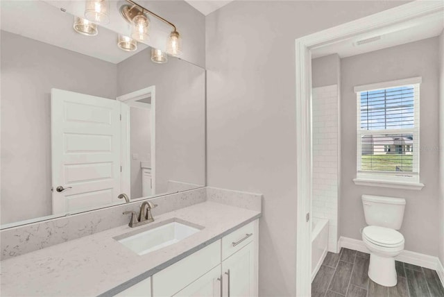 full bathroom with shower / bathtub combination, oversized vanity, and toilet