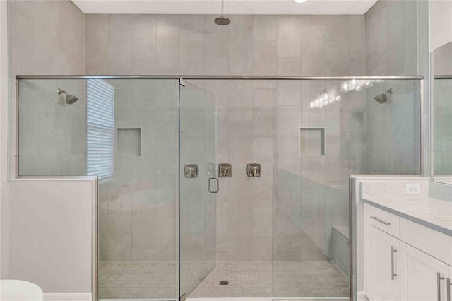 bathroom featuring walk in shower