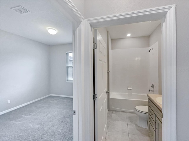 full bathroom featuring toilet, tile flooring, vanity, and shower / tub combination