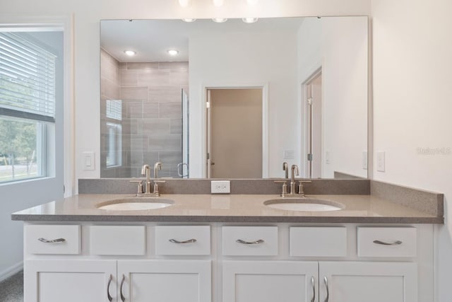 bathroom with dual vanity