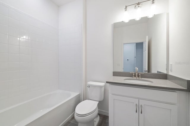 full bathroom with toilet, oversized vanity, tiled shower / bath combo, and tile flooring