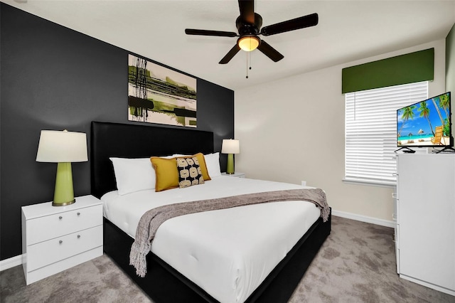 bedroom with light colored carpet and ceiling fan