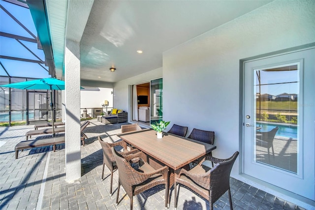 view of patio with a lanai and outdoor lounge area