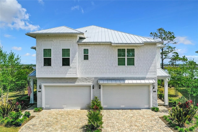 view of front of property with a garage