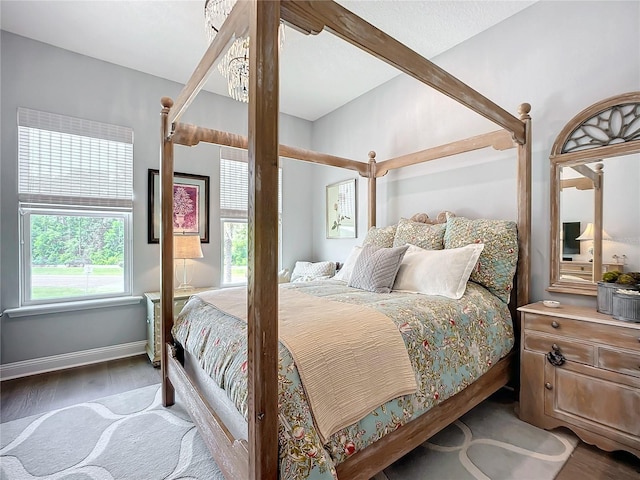 bedroom with wood-type flooring