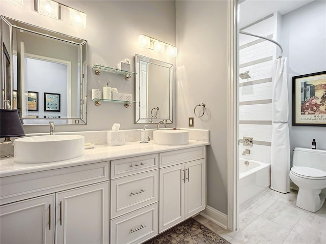 full bathroom featuring shower / bath combination with curtain, vanity, and toilet