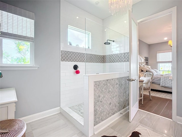 bathroom with a tile shower