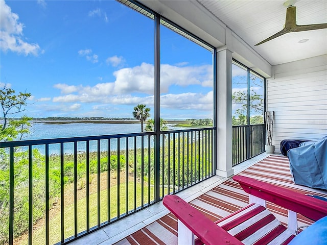 sunroom with a water view