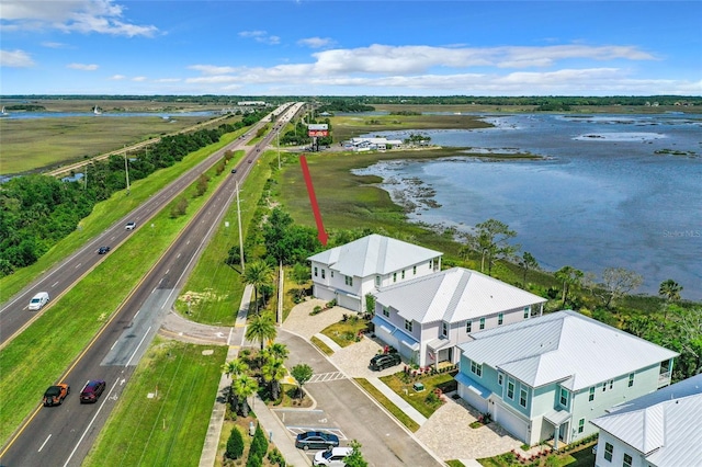 drone / aerial view featuring a water view