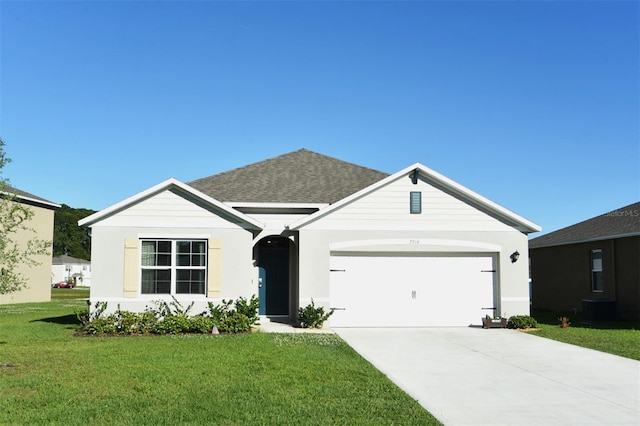 view of front of property with a front lawn, central air condition unit, and a garage