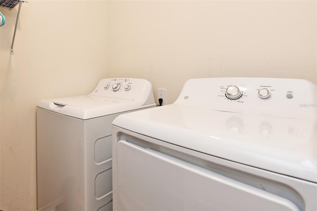 laundry area featuring washing machine and dryer