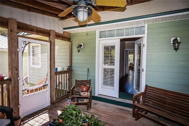 exterior space with ceiling fan