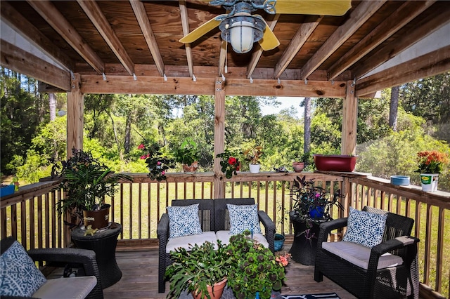 wooden deck with ceiling fan