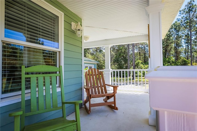 view of terrace featuring covered porch