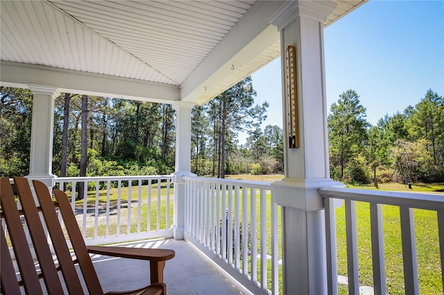 balcony featuring covered porch