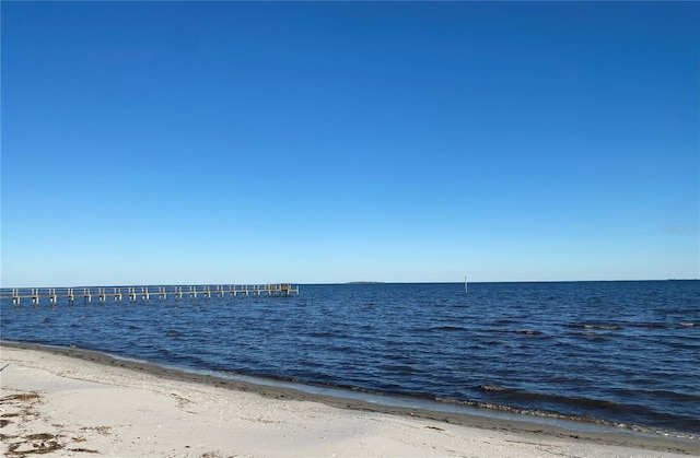 property view of water featuring a beach view