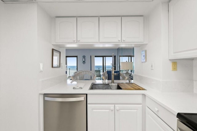 kitchen featuring white cabinetry, sink, and stainless steel appliances