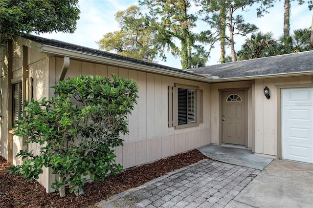 property entrance featuring a garage