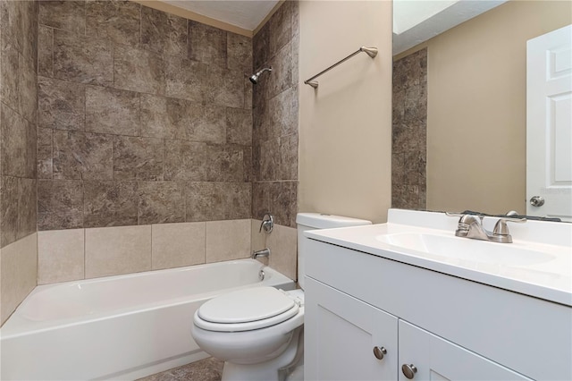 full bathroom featuring toilet, tiled shower / bath combo, and oversized vanity