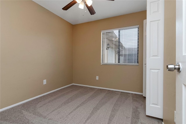 unfurnished room featuring ceiling fan and light carpet