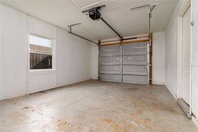 garage featuring a garage door opener