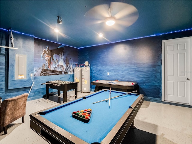 game room with pool table, ceiling fan, and water heater