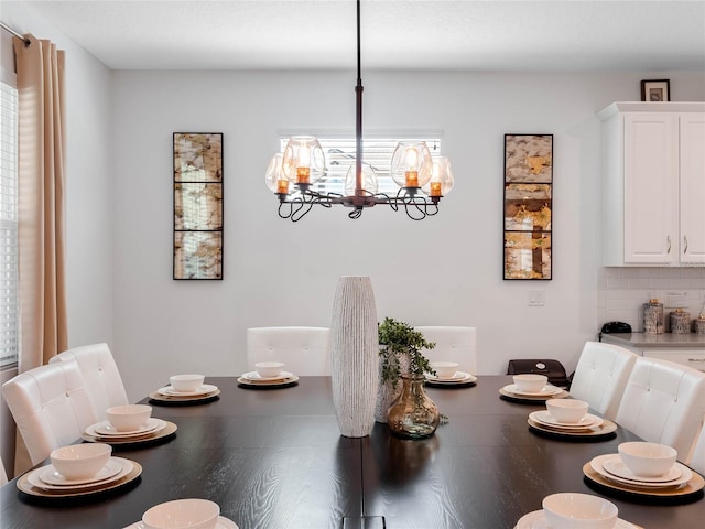 dining room with an inviting chandelier