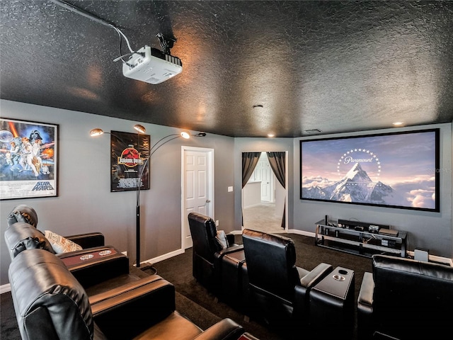 carpeted home theater featuring a textured ceiling