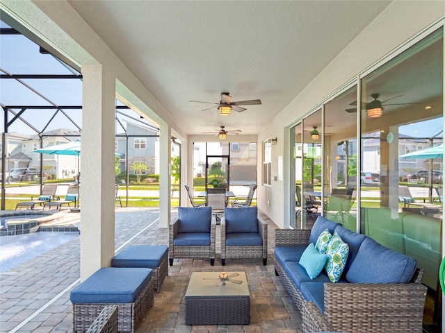 sunroom / solarium with ceiling fan