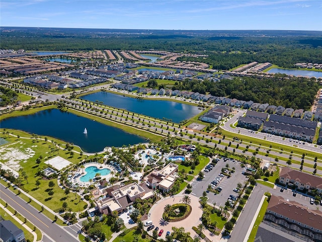 drone / aerial view with a water view