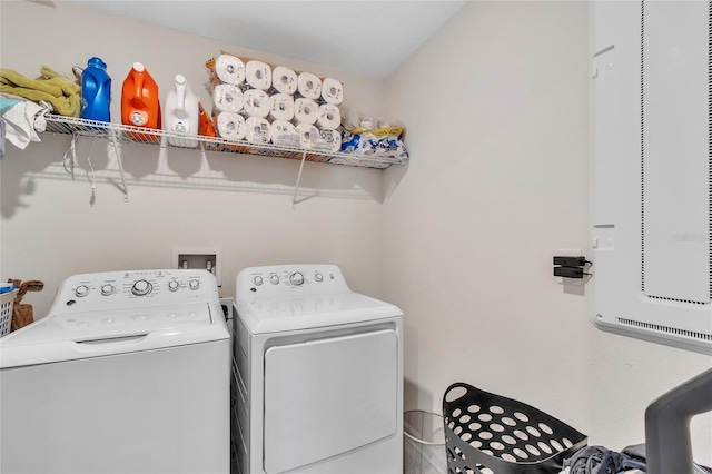 laundry room featuring washer hookup and washer and dryer