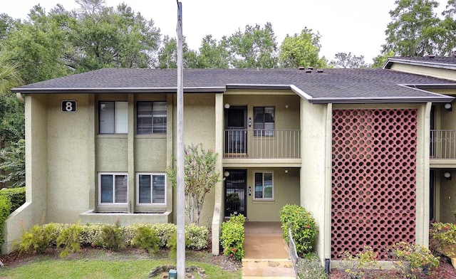 view of property featuring a balcony