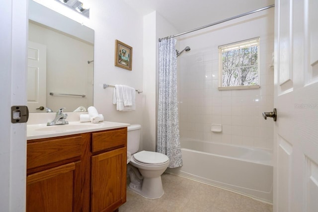 full bathroom featuring shower / tub combo with curtain, vanity, and toilet