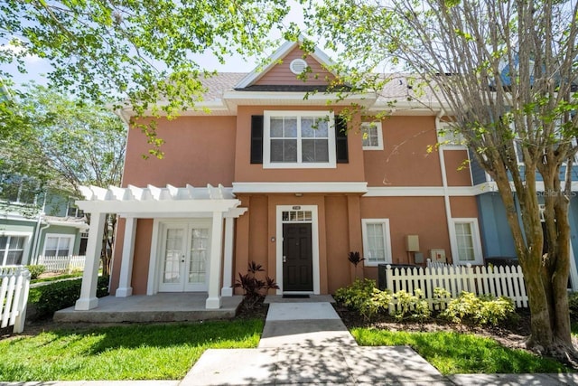 view of front facade featuring french doors