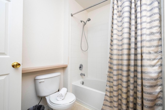 bathroom with shower / bathtub combination with curtain and toilet