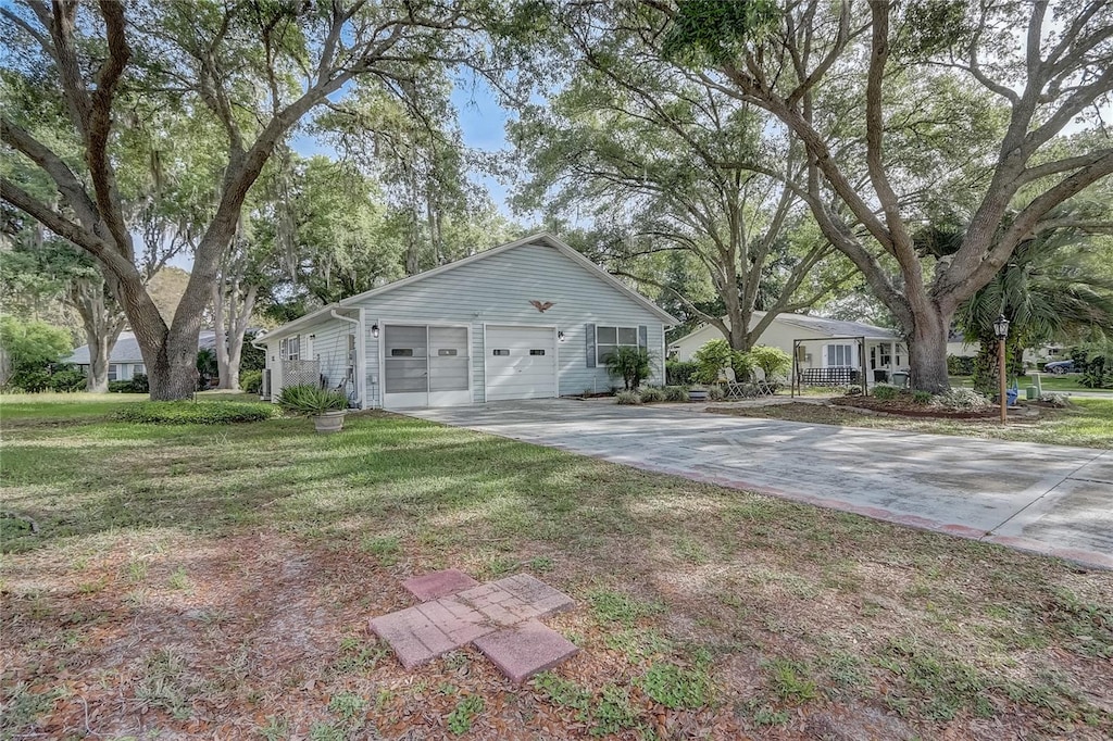 view of yard with a garage