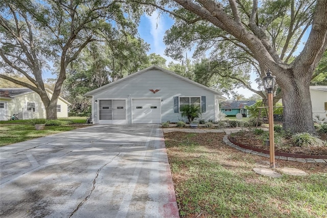 single story home with a garage